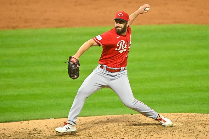 Sep 26, 2023; Cleveland, Ohio, USA; Cincinnati Reds relief pitcher Sam Moll (50) delivers a pitch in the fourth inning against the Cleveland Guardians at Progressive Field. Mandatory Credit: David Richard-USA TODAY Sports