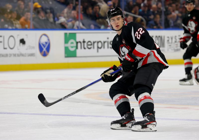 Jan 11, 2024; Buffalo, New York, USA;  Buffalo Sabres right wing Jack Quinn (22) looks for the puck during the first period against the Ottawa Senators at KeyBank Center. Mandatory Credit: Timothy T. Ludwig-USA TODAY Sports