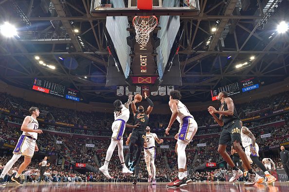 CLEVELAND, OH - NOVEMBER 25: Donovan Mitchell #45 of the Cleveland Cavaliers drives to the basket during the game against the Los Angeles Lakers on November 25, 2023 at Rocket Mortgage FieldHouse in Cleveland, Ohio. NOTE TO USER: User expressly acknowledges and agrees that, by downloading and/or using this Photograph, user is consenting to the terms and conditions of the Getty Images License Agreement. Mandatory Copyright Notice: Copyright 2023 NBAE (Photo by David Liam Kyle/NBAE via Getty Images)