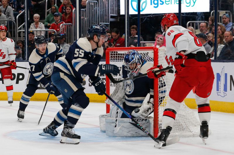 Apr 16, 2024; Columbus, Ohio, USA; Columbus Blue Jackets goalie Jet Greaves (73) stops the shot attempt of Carolina Hurricanes center Martin Necas (88) during the first period at Nationwide Arena. Mandatory Credit: Russell LaBounty-USA TODAY Sports