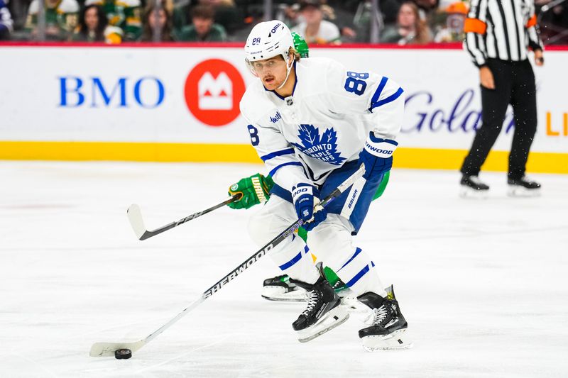 Nov 3, 2024; Saint Paul, Minnesota, USA; Toronto Maple Leafs right wing William Nylander (88) carries the puck during the third period against the Minnesota Wild at Xcel Energy Center. Mandatory Credit: Brace Hemmelgarn-Imagn Images