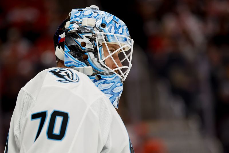 Dec 17, 2025; Detroit, Michigan, USA;  Utah Mammoth goaltender Karel Vejmelka (70) looks on in the second period against the Detroit Red Wings at Little Caesars Arena. Mandatory Credit: Rick Osentoski-Imagn Images