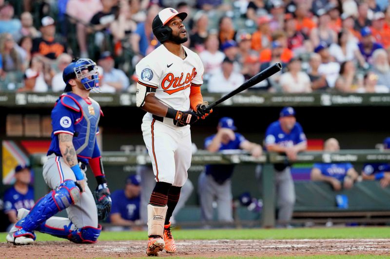 Jun 27, 2024; Baltimore, Maryland, USA; Baltimore Orioles outfielder Cedric Mullins (31) watches his two-run home run in the fourth inning against the Texas Rangers at Oriole Park at Camden Yards. Mandatory Credit: Mitch Stringer-USA TODAY Sports