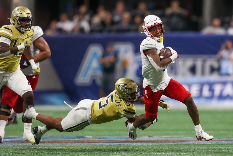 Sep 1, 2023; Atlanta, Georgia, USA; Louisville Cardinals wide receiver Jamari Thrash (1) runs after a catch against the Georgia Tech Yellow Jackets in the fourth quarter at Mercedes-Benz Stadium. Mandatory Credit: Brett Davis-USA TODAY Sports