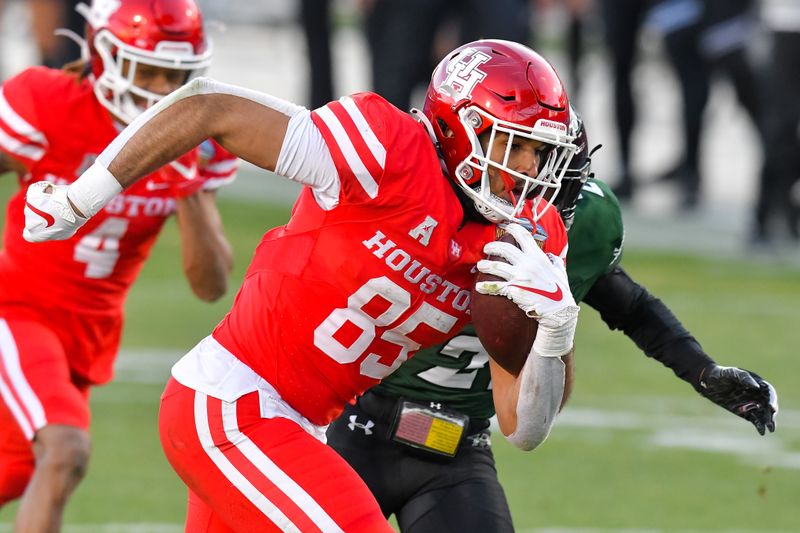 Dec 24, 2020; Frisco, Texas, USA;  Houston Cougars tight end Christian Trahan (85) scores a touchdown against Hawaii Warriors during the second half at Toyota Stadium. Mandatory Credit: Tim Flores-USA TODAY Sports