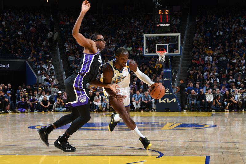 SAN FRANCISCO, CA - OCTOBER 11: Jonathan Kuminga #00 of the Golden State Warriors handles the ball during the game against the Sacramento Kings during a NBA Preseason game on October 11, 2024 at Chase Center in San Francisco, California. NOTE TO USER: User expressly acknowledges and agrees that, by downloading and or using this photograph, user is consenting to the terms and conditions of Getty Images License Agreement. Mandatory Copyright Notice: Copyright 2024 NBAE (Photo by Noah Graham/NBAE via Getty Images)