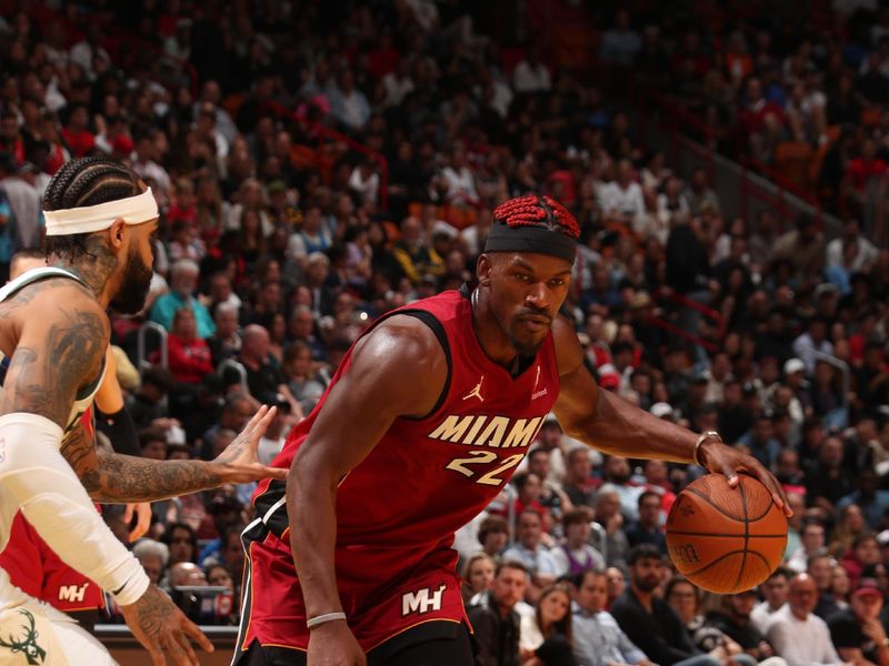 MIAMI, FL - NOVEMBER 26: Jimmy Butler #22 of the Miami Heat handles the ball during the game against the Milwaukee Bucks during the Emirates NBA Cup game on November 26, 2024 at Kaseya Center in Miami, Florida. NOTE TO USER: User expressly acknowledges and agrees that, by downloading and or using this Photograph, user is consenting to the terms and conditions of the Getty Images License Agreement. Mandatory Copyright Notice: Copyright 2024 NBAE (Photo by Issac Baldizon/NBAE via Getty Images)