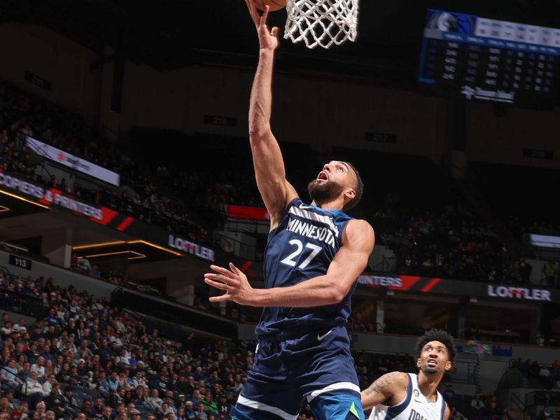 MINNEAPOLIS, MN -  DECEMBER 21: Rudy Gobert #27 of the Minnesota Timberwolves drives to the basket during the game against the Dallas Mavericks on December 21, 2022 at Target Center in Minneapolis, Minnesota. NOTE TO USER: User expressly acknowledges and agrees that, by downloading and or using this Photograph, user is consenting to the terms and conditions of the Getty Images License Agreement. Mandatory Copyright Notice: Copyright 2022 NBAE (Photo by David Sherman/NBAE via Getty Images)