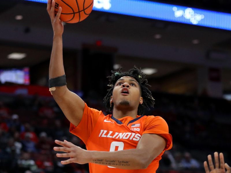 Jan 30, 2024; Columbus, Ohio, USA; Illinois Fighting Illini guard Terrence Shannon Jr. (0) goes to the basket for the score as Ohio State Buckeyes center Felix Okpara (34)  and guard Roddy Gayle Jr. (1) defend during the first half at Value City Arena. Mandatory Credit: Joseph Maiorana-USA TODAY Sports