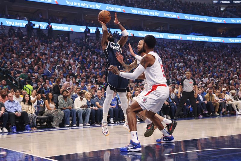 DALLAS, TX - APRIL 28: Kyrie Irving #11 of the Dallas Mavericks shoots the ball during the game against the LA Clippers during Round 1 Game 4 of the 2024 NBA Playoffs on April 28, 2024 at the American Airlines Center in Dallas, Texas. NOTE TO USER: User expressly acknowledges and agrees that, by downloading and or using this photograph, User is consenting to the terms and conditions of the Getty Images License Agreement. Mandatory Copyright Notice: Copyright 2024 NBAE (Photo by Tim Heitman/NBAE via Getty Images)