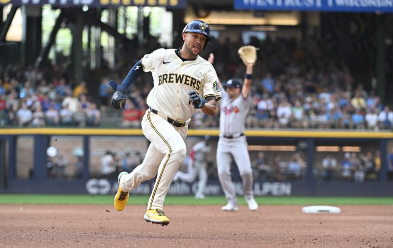 Jul 31, 2024; Milwaukee, Wisconsin, USA; Milwaukee Brewers outfielder Blake Perkins (16) advances to third base against the Atlanta Braves in the fourth inning at American Family Field. Mandatory Credit: Michael McLoone-USA TODAY Sports