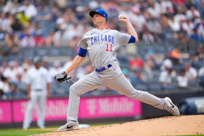 Jul 8, 2023; Bronx, New York, USA; Chicago Cubs pitcher Drew Smyly (11) pitches against the New York Yankees during the first inning at Yankee Stadium. Mandatory Credit: Gregory Fisher-USA TODAY Sports