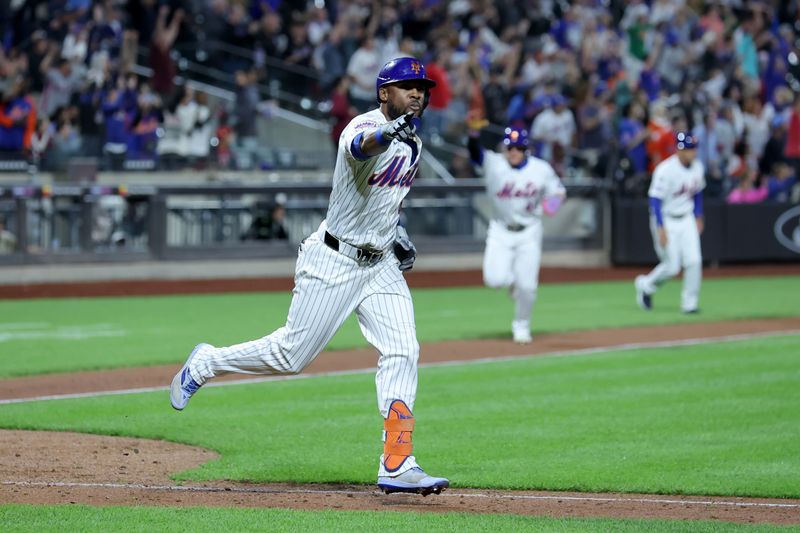 Sep 16, 2024; New York City, New York, USA; New York Mets right fielder Starling Marte (6) reacts after hitting a tenth inning walkoff single against the Washington Nationals at Citi Field. Mandatory Credit: Brad Penner-Imagn Images