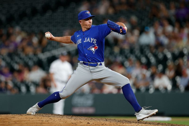 Sep 1, 2023; Denver, Colorado, USA; Toronto Blue Jays relief pitcher Chad Green (37) pitches in the ninth inning against the Colorado Rockies at Coors Field. Mandatory Credit: Isaiah J. Downing-USA TODAY Sports