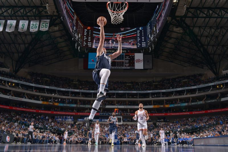 DALLAS, TX - NOVEMBER 8: Luka Doncic #77 of the Dallas Mavericks drives to the basket during the game against the Phoenix Suns on November 6, 2024 at the American Airlines Center in Dallas, Texas. NOTE TO USER: User expressly acknowledges and agrees that, by downloading and or using this photograph, User is consenting to the terms and conditions of the Getty Images License Agreement. Mandatory Copyright Notice: Copyright 2024 NBAE (Photo by Glenn James/NBAE via Getty Images)