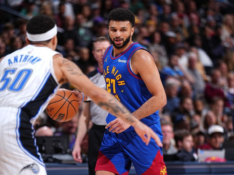 DENVER, CO - JANUARY 5: Jamal Murray #27 of the Denver Nuggets dribbles the ball during the game against the Orlando Magic on January 5, 2024 at the Ball Arena in Denver, Colorado. NOTE TO USER: User expressly acknowledges and agrees that, by downloading and/or using this Photograph, user is consenting to the terms and conditions of the Getty Images License Agreement. Mandatory Copyright Notice: Copyright 2024 NBAE (Photo by Garrett Ellwood/NBAE via Getty Images)