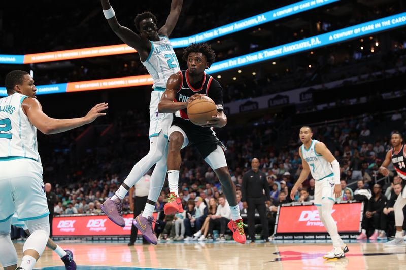 CHARLOTTE, NC - APRIL 3:  Ashton Hagans #19 of the Portland Trail Blazers drives to the basket during the game against the Charlotte Hornets on April 3, 2024 at Spectrum Center in Charlotte, North Carolina. NOTE TO USER: User expressly acknowledges and agrees that, by downloading and or using this photograph, User is consenting to the terms and conditions of the Getty Images License Agreement.  Mandatory Copyright Notice:  Copyright 2024 NBAE (Photo by Brock Williams-Smith/NBAE via Getty Images)