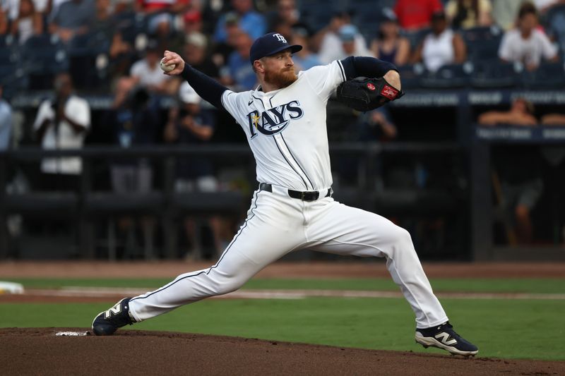 Jun 30, 2025; Tampa, Florida, USA;  Tampa Bay Rays starting pitcher Drew Rasmussen (57) throws a pitch during the first inning against the Athletics at George M. Steinbrenner Field. Mandatory Credit: Kim Klement Neitzel-Imagn Images