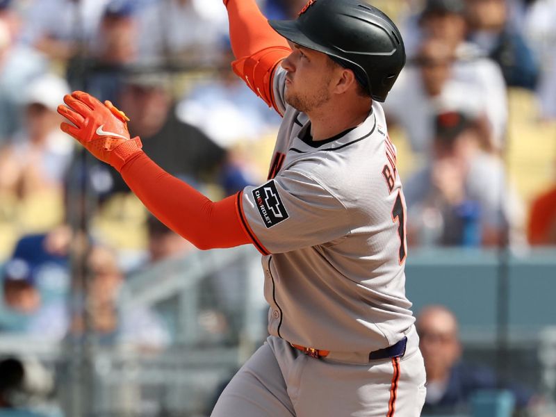 Sep 21, 2025; Los Angeles, California, USA;  San Francisco Giants catcher Patrick Bailey (14) hits an RBI ground-rule double during the eighth inning against the Los Angeles Dodgers at Dodger Stadium. Mandatory Credit: Kiyoshi Mio-Imagn Images