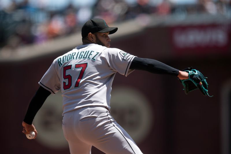 May 14, 2025; San Francisco, California, USA; Arizona Diamondbacks starting pitcher Eduardo Rodriguez (57) delivers a pitch against the San Francisco Giants during the second inning at Oracle Park. Mandatory Credit: D. Ross Cameron-Imagn Images