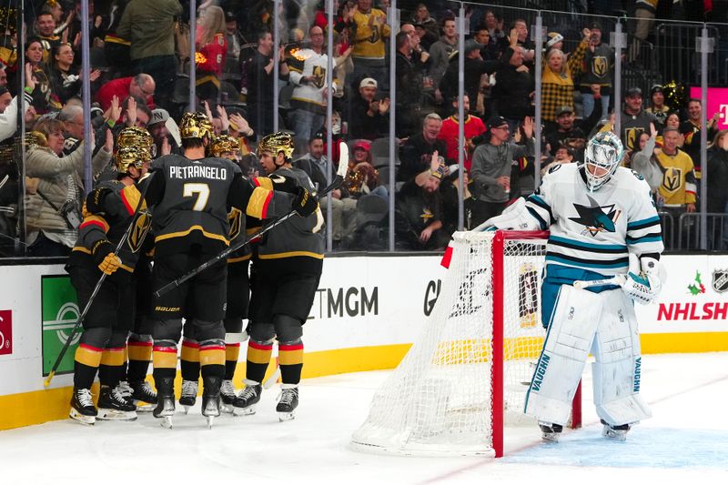 Dec 10, 2023; Las Vegas, Nevada, USA; Vegas Golden Knights players celebrate a goal scored by Vegas Golden Knights right wing Jonathan Marchessault (81) against San Jose Sharks goaltender Kaapo Kahkonen (36) during the second period at T-Mobile Arena. Mandatory Credit: Stephen R. Sylvanie-USA TODAY Sports