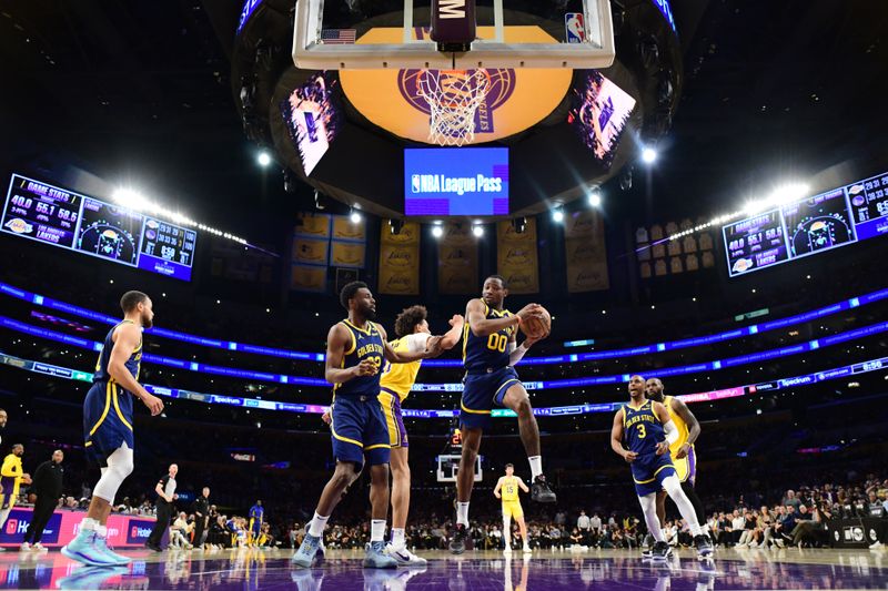 LOS ANGELES, CA - APRIL 9:Jonathan Kuminga #00 of the Golden State Warriors rebounds the ball during the game against the Los Angeles Lakers on April 9, 2024 at Crypto.Com Arena in Los Angeles, California. NOTE TO USER: User expressly acknowledges and agrees that, by downloading and/or using this Photograph, user is consenting to the terms and conditions of the Getty Images License Agreement. Mandatory Copyright Notice: Copyright 2024 NBAE (Photo by Adam Pantozzi/NBAE via Getty Images)