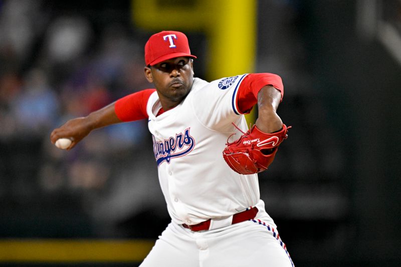 Jun 28, 2025; Arlington, Texas, USA; Texas Rangers starting pitcher Kumar Rocker (80) pitches against the Seattle Mariners during the first inning at Globe Life Field. Mandatory Credit: Jerome Miron-Imagn Images