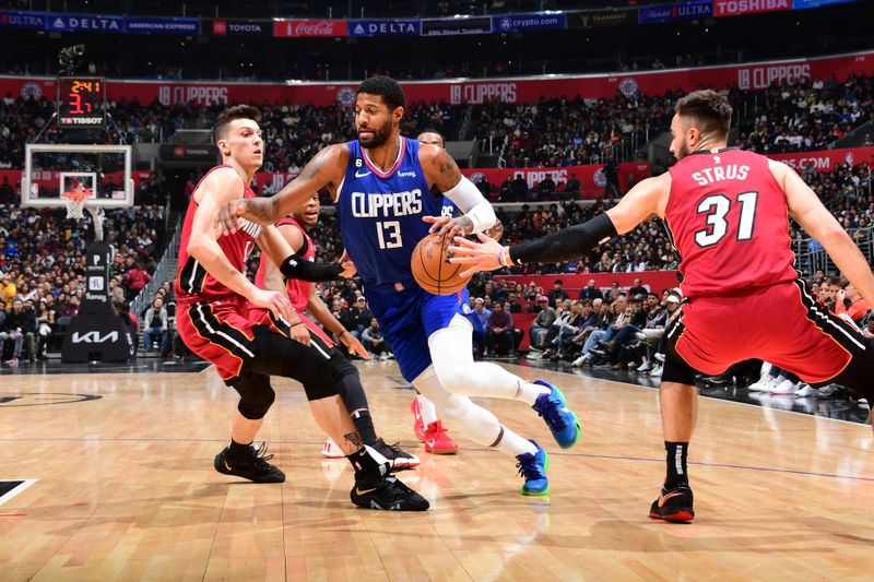 LOS ANGELES, CA - JANUARY 2: Paul George #13 of the LA Clippers handles the ball during the game against the Miami Heat on January 2, 2023 at Crypto.Com Arena in Los Angeles, California. NOTE TO USER: User expressly acknowledges and agrees that, by downloading and/or using this Photograph, user is consenting to the terms and conditions of the Getty Images License Agreement. Mandatory Copyright Notice: Copyright 2023 NBAE (Photo by Adam Pantozzi/NBAE via Getty Images)