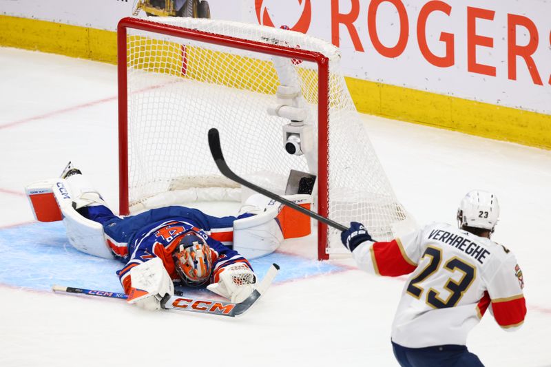 Jun 15, 2024; Edmonton, Alberta, CAN; Edmonton Oilers goaltender Stuart Skinner (74) makes a save in front of Florida Panthers center Carter Verhaeghe (23) in the first period in game four of the 2024 Stanley Cup Final at Rogers Place. Mandatory Credit: Sergei Belski-USA TODAY Sports