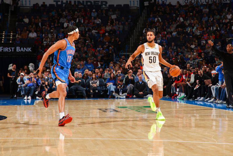 OKLAHOMA CITY, OK - NOVEMBER 13:  Jeremiah Robinson-Earl #50 of the New Orleans Pelicans dribbles the ball during the game against the Oklahoma City Thunder on November 13, 2024 at Paycom Center in Oklahoma City, Oklahoma. NOTE TO USER: User expressly acknowledges and agrees that, by downloading and or using this photograph, User is consenting to the terms and conditions of the Getty Images License Agreement. Mandatory Copyright Notice: Copyright 2024 NBAE (Photo by Zach Beeker/NBAE via Getty Images)