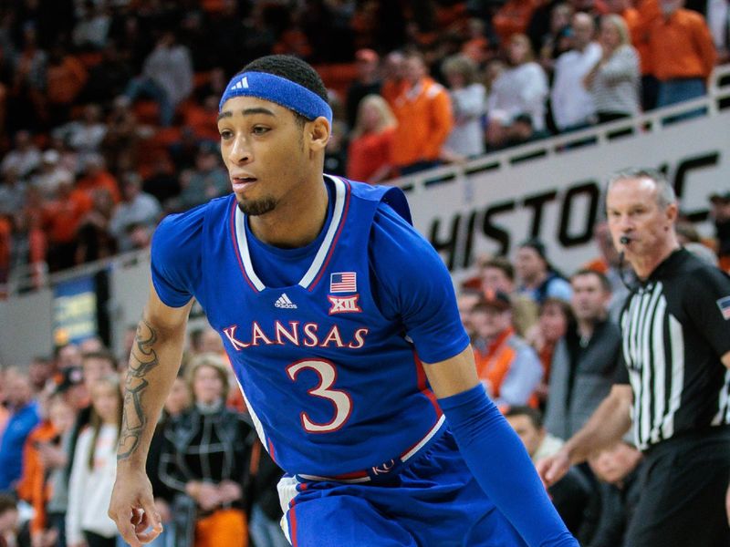 Jan 16, 2024; Stillwater, Oklahoma, USA; Kansas Jayhawks guard Dajuan Harris Jr. (3) drives to the basket during the second half against the Oklahoma State Cowboys at Gallagher-Iba Arena. Mandatory Credit: William Purnell-USA TODAY Sports