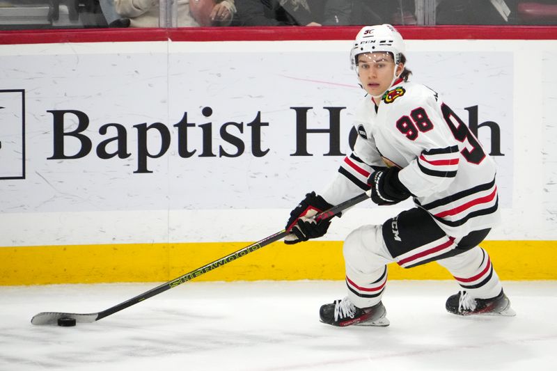 Nov 12, 2023; Sunrise, Florida, USA; Chicago Blackhawks center Connor Bedard (98) skates with the puck against the Florida Panthers during the third period at Amerant Bank Arena. Mandatory Credit: Jasen Vinlove-USA TODAY Sports