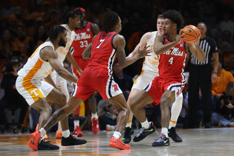 Jan 6, 2024; Knoxville, Tennessee, USA; Mississippi Rebels forward Jaemyn Brakefield (4) looks to pass the ball against the Tennessee Volunteers during the first half at Thompson-Boling Arena at Food City Center. Mandatory Credit: Randy Sartin-USA TODAY Sports