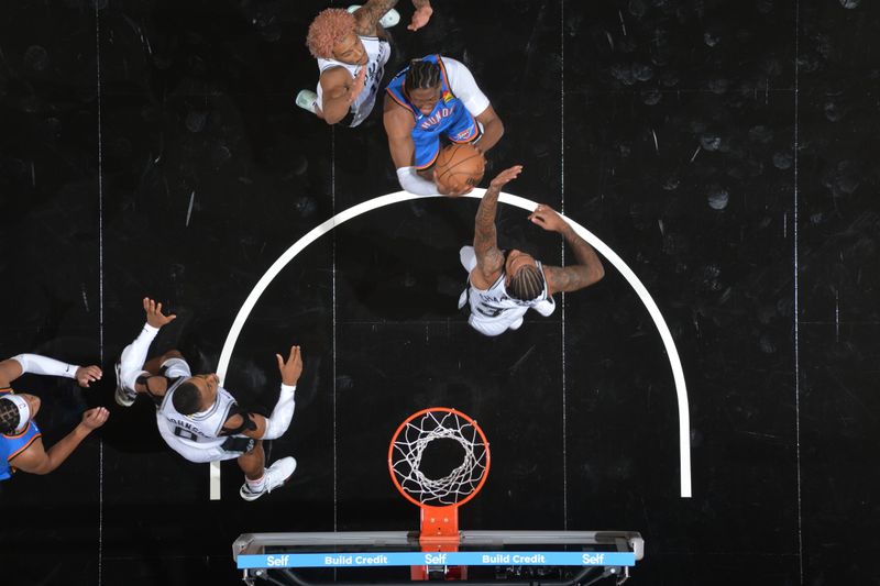 SAN ANTONIO, TX - OCTOBER 7: Jalen Williams #8 of the Oklahoma City Thunder drives to the basket during the game against the San Antonio Spurs during a NBA preseason game on October 7, 2024 at the Frost Bank Center in San Antonio, Texas. NOTE TO USER: User expressly acknowledges and agrees that, by downloading and or using this photograph, user is consenting to the terms and conditions of the Getty Images License Agreement. Mandatory Copyright Notice: Copyright 2024 NBAE (Photos by Michael Gonzales/NBAE via Getty Images)