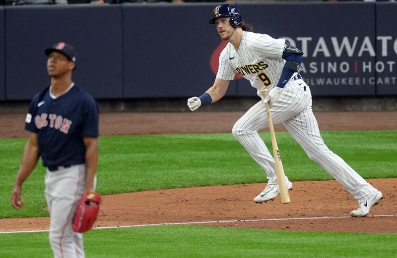 Apr 23, 2023; Milwaukee, Wisconsin, USA; Milwaukee Brewers third baseman Brian Anderson (9) hits a solo home run off of Boston Red Sox starting pitcher Brayan Bello (66) during the fourth inning at American Family Field. Mandatory Credit: Mark Hoffman-USA TODAY Sports