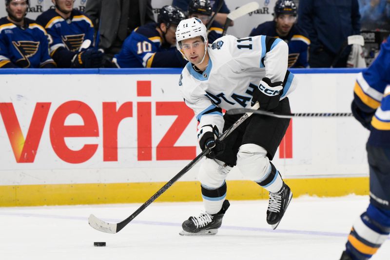 Nov 7, 2024; St. Louis, Missouri, USA; Utah Hockey Club right wing Dylan Guenther (11) skates against the St. Louis Blues during the third period at Enterprise Center. Mandatory Credit: Jeff Le-Imagn Images