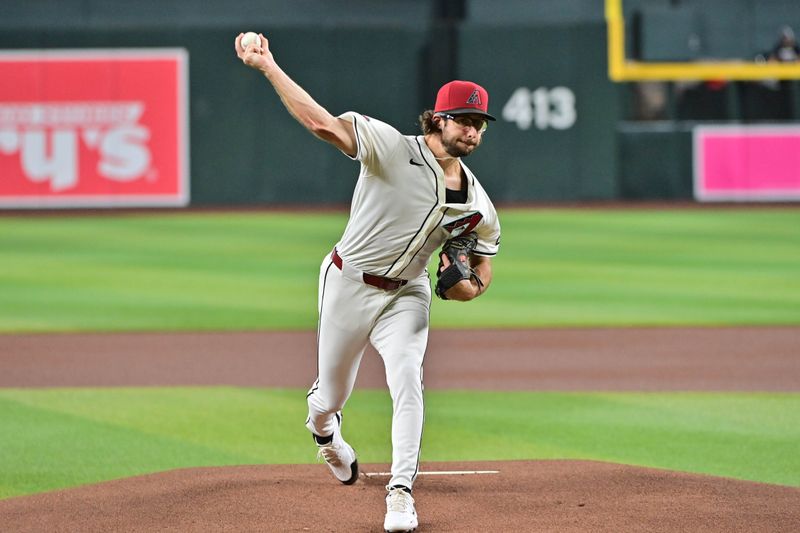 Jul 31, 2024; Phoenix, Arizona, USA;  Arizona Diamondbacks pitcher Zac Gallen (23) throws against the Washington Nationals in the first inning at Chase Field. Mandatory Credit: Matt Kartozian-USA TODAY Sports