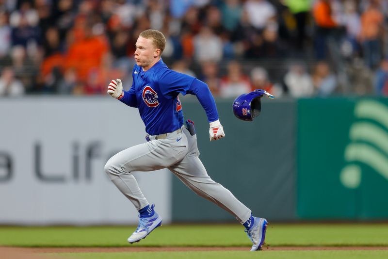 Jun 24, 2024; San Francisco, California, USA; Chicago Cubs outfielder Pete Crow-Armstrong (52) hits a triple during the sixth inning against the San Francisco Giants at Oracle Park. All Giants players wore the number 24 in honor of Giants former player Willie Mays. Mandatory Credit: Sergio Estrada-USA TODAY Sports