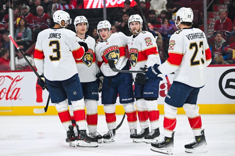 Mar 15, 2025; Montreal, Quebec, CAN; Florida Panthers right wing Mackie Samoskevich (25) celebrates with his teammates his goal against the Montreal Canadiens in the second period at Bell Centre. Mandatory Credit: David Kirouac-Imagn Images