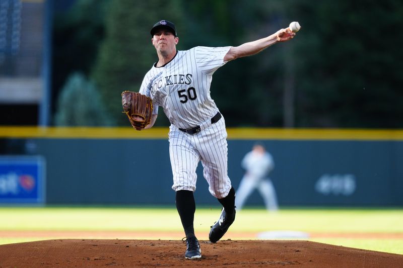 May 29, 2024; Denver, Colorado, USA; Colorado Rockies pitcher Ty Blach (50) delivers a pitch in the first inning against the Cleveland Guardians at Coors Field. Mandatory Credit: Ron Chenoy-USA TODAY Sports