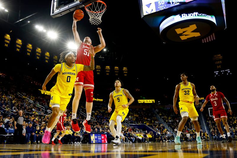 Mar 10, 2024; Ann Arbor, Michigan, USA;  Nebraska Cornhuskers forward Rienk Mast (51) shoots on d0 in the second half at Crisler Center. Mandatory Credit: Rick Osentoski-USA TODAY Sports