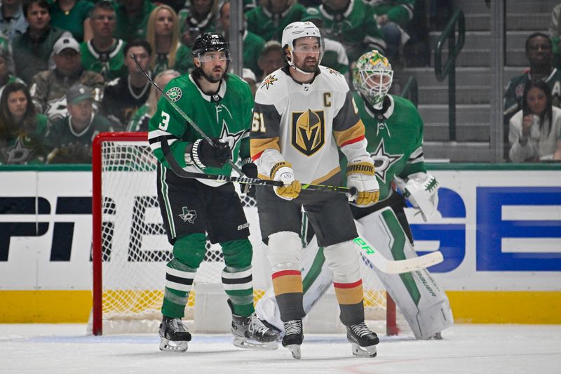 May 1, 2024; Dallas, Texas, USA; Dallas Stars defenseman Chris Tanev (3) and goaltender Jake Oettinger (29) and Vegas Golden Knights right wing Mark Stone (61) look for the puck in the Dallas zone during the second period in game five of the first round of the 2024 Stanley Cup Playoffs at the American Airlines Center. Mandatory Credit: Jerome Miron-USA TODAY Sports