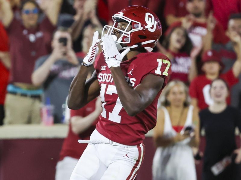 Sep 10, 2022; Norman, Oklahoma, USA;  Oklahoma Sooners wide receiver Marvin Mims (17) reacts after scoring a touchdown during the second half against the Kent State Golden Flashes at Gaylord Family-Oklahoma Memorial Stadium. Mandatory Credit: Kevin Jairaj-USA TODAY Sports