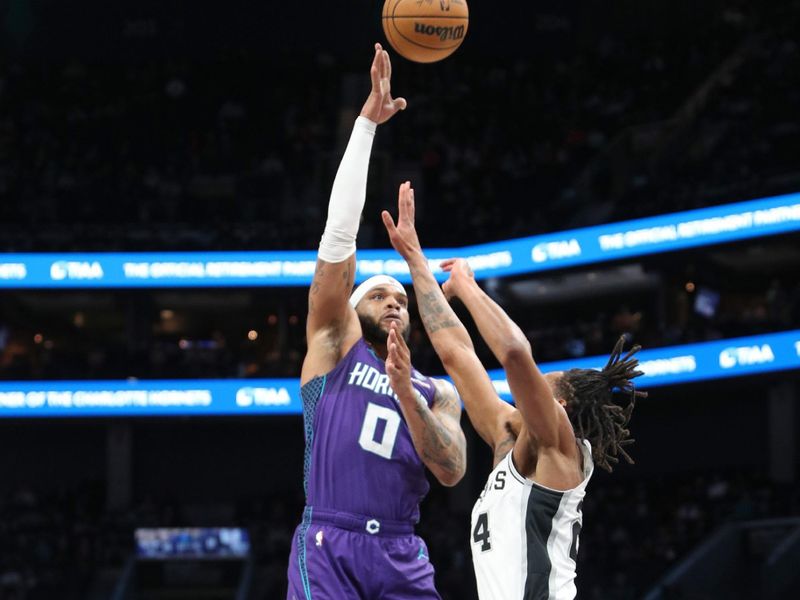 CHARLOTTE, NC - JANUARY 19: Miles Bridges #0 of the Charlotte Hornets drives to the basket during the game against the San Antonio Spurs on January 19, 2024 at Spectrum Center in Charlotte, North Carolina. NOTE TO USER: User expressly acknowledges and agrees that, by downloading and or using this photograph, User is consenting to the terms and conditions of the Getty Images License Agreement.  Mandatory Copyright Notice:  Copyright 2024 NBAE (Photo by Brock Williams-Smith/NBAE via Getty Images)