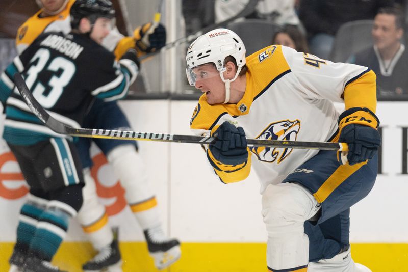 Feb 24, 2024; San Jose, California, USA; Nashville Predators right wing Michael McCarron (47) shoots during the first period against the San Jose Sharks at SAP Center at San Jose. Mandatory Credit: Stan Szeto-USA TODAY Sports