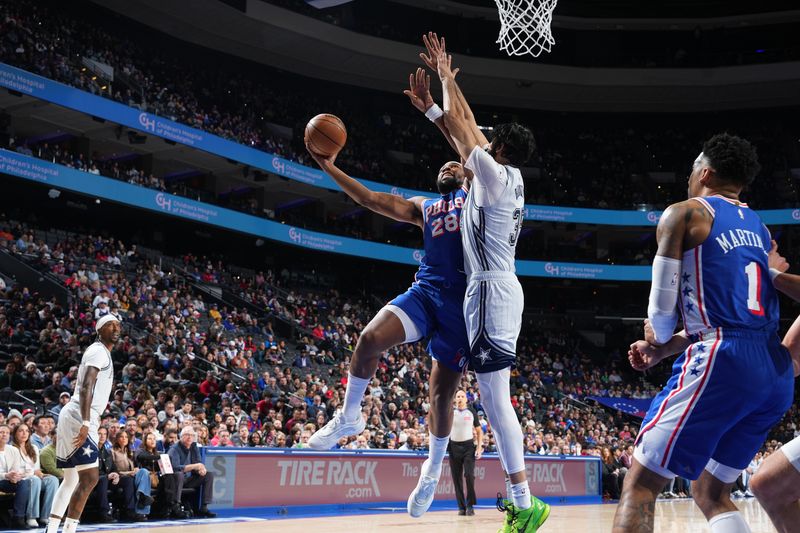 PHILADELPHIA, PA - DECEMBER 4: Guerschon Yabusele #28 of the Philadelphia 76ers drives to the basket during the game against the Orlando Magic on December 4, 2024 at the Wells Fargo Center in Philadelphia, Pennsylvania NOTE TO USER: User expressly acknowledges and agrees that, by downloading and/or using this Photograph, user is consenting to the terms and conditions of the Getty Images License Agreement. Mandatory Copyright Notice: Copyright 2024 NBAE (Photo by Jesse D. Garrabrant/NBAE via Getty Images)