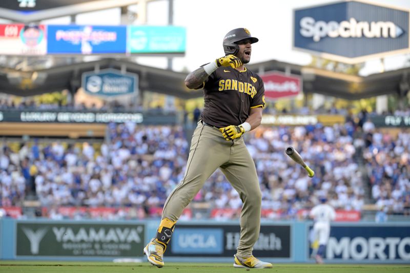 Oct 6, 2024; Los Angeles, California, USA; San Diego Padres outfielder David Peralta (24) celebrates after hitting a two run home run in the second inning against the Los Angeles Dodgers during game two of the NLDS for the 2024 MLB Playoffs at Dodger Stadium. Mandatory Credit: Jayne Kamin-Oncea-Imagn Images