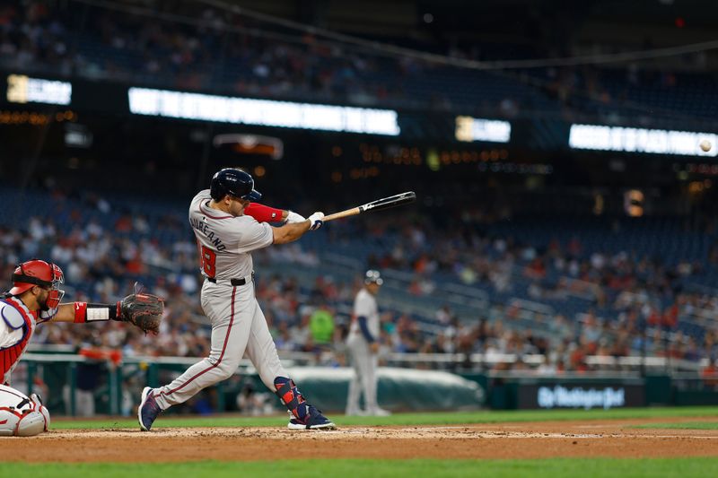 Sep 10, 2024; Washington, District of Columbia, USA; Atlanta Braves outfielder Ramón Laureano (18) hits a two run double against the Washington Nationals during the third inning at Nationals Park. Mandatory Credit: Geoff Burke-Imagn Images