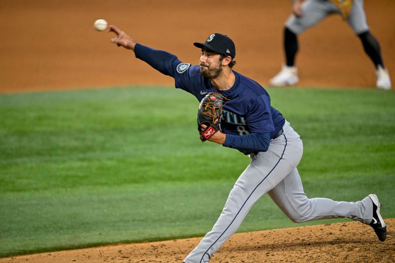 Sep 22, 2024; Arlington, Texas, USA; Seattle Mariners relief pitcher JT Chargois (84) pitches against the Texas Rangers during the seventh inning at Globe Life Field. Mandatory Credit: Jerome Miron-Imagn Images