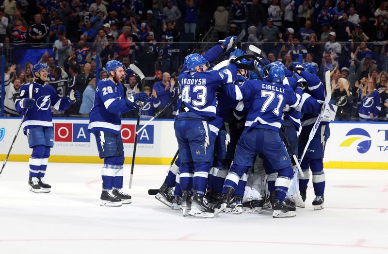 Nov 20, 2025; Tampa, Florida, USA; Tampa Bay Lightning celebrate after they beat the Edmonton Oilers during overtime at Benchmark International Arena. Mandatory Credit: Kim Klement Neitzel-Imagn Images Nov 20, 2025; Tampa, Florida, USA; Tampa Bay Lightning celebrate after they beat the Edmonton Oilers during overtime at Benchmark International Arena. Mandatory Credit: Kim Klement Neitzel-Imagn Images
